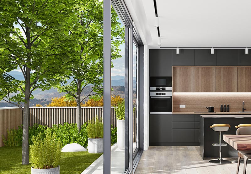 A kitchen and an outdoor patio area.